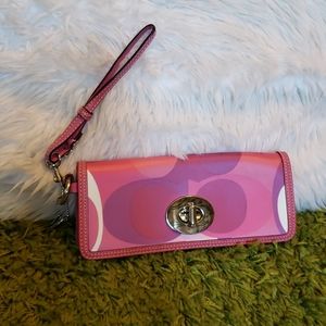 Pink and purple Coach wristlet